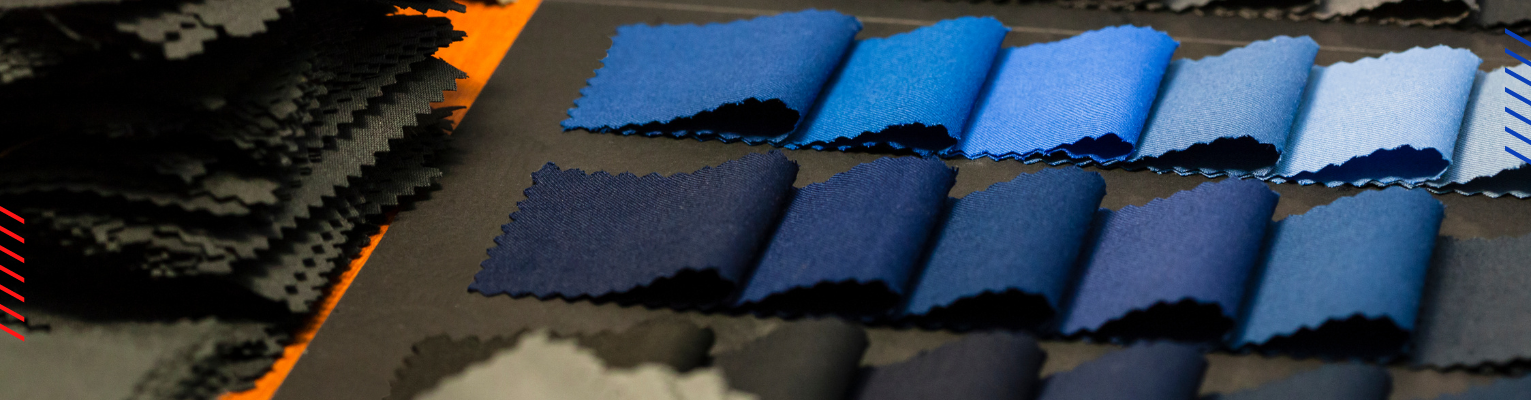 Multiple small fabric samples in different color shades laid out for display